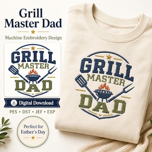 May include: A cream-colored crewneck sweatshirt featuring an embroidered design that reads Grill Master Dad in navy and olive green thread. The graphic includes a charcoal grill with orange flames, a spatula, and a fork within a circular frame.
