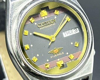 Raro reloj de pulsera Citizen Eagle 7 vintage con esfera negra, indicador de día y fecha, movimiento automático japonés n.° 8200A para hombre.