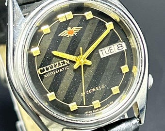 Raro reloj de pulsera Citizen Eagle 7 vintage con esfera negra, indicador de día y fecha, movimiento automático japonés n.° 8200A para hombre.