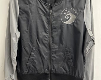 Nightmare Before Christmas Bomber Jacket. Black /Silver Sleeve.  Adult M.  NWT.
