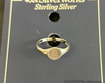 Sterling Silver Ring. Engraveable. Size 7. New On Card. Great for young girls.