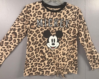 Disney Girls Top. Brown Animal Print with Mickey on Front. Size Medium. NWT
