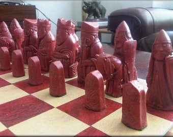 Stonecast Isle of Lewis Chess Set - Antique Red and Aged Stone with Optional Chess Mat