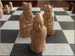 Isle of Lewis Chess Set with unusual Toothy Berserker in Antique Red & Aged Sandstone with optional Vinyl Chess Boar 