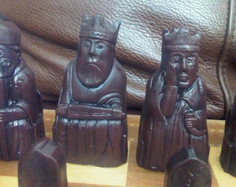 Vintage Isle of Lewis chess set.  Deep walnut and antique stone with two extra queens with optional Vinyl Chess Board