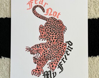 May include: A pink and black leopard print illustration with the text "Fear Not My Friend" in black.