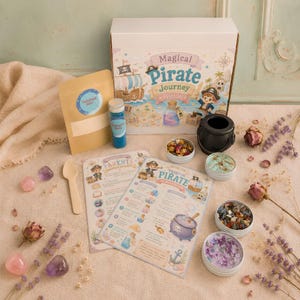 May include: A Magical Pirate Journey Potion kit featuring a white box with pirate illustrations, two instruction sheets, a beige pouch, a blue powder vial, a wooden spoon, a black plastic cauldron, and four small tins filled with colourful ingredients.