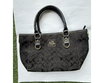 Bolso de mano COACH Signature / Asa superior de lona negra y asa de cuero