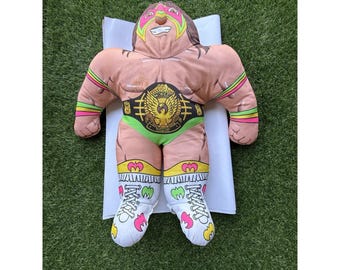 Poduszka pluszowa WWF Ultimate Warrior z lat 90., TONKA Wrestling Buddies, styl vintage z lat 90.
