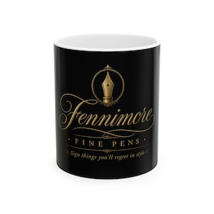 May include: A black ceramic mug with a white interior featuring a gold fountain pen nib icon inside a circle, the text Fennimore FINE PENS, and the phrase Sign things you'll regret in style printed in gold lettering on the front surface.
