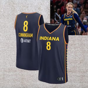 May include: A navy blue basketball jersey featuring the word INDIANA and the number 8 in yellow on the front. The back displays the name CUNNINGHAM, the number 8, and the AT&T logo. The sides are accented with yellow and red star patterns.