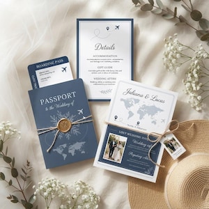 May include: A travel-themed wedding invitation set featuring a navy blue passport-style booklet with a gold wax seal, a boarding pass, a details card, and a main invitation card with a world map, all tied with twine and decorated with floral accents.
