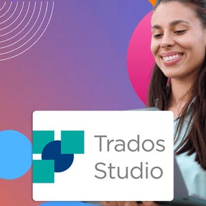 May include: The image shows the "Trados Studio" logo on a white rectangle, with a woman smiling in the background. The logo incorporates teal squares and a dark blue circle. The background has a gradient of purple, orange, and blue.