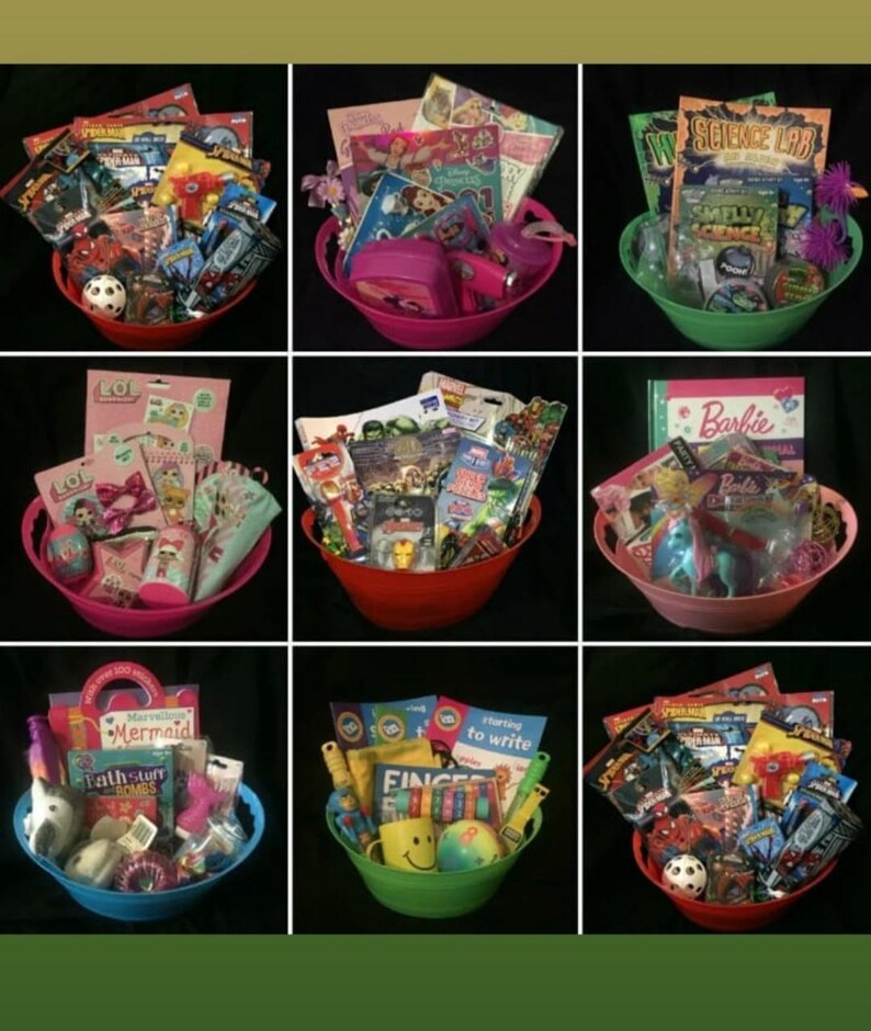 May include: Nine colorful gift baskets filled with toys, books, and accessories. Each basket is a different color, including red, pink, green, and blue. The baskets contain items like Barbie dolls, LOL Surprise items, and Spider-Man toys. Some baskets include a soccer ball.