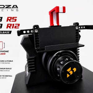 May include: Black MOZA Racing wheelbase with red and white detailing. Includes a smartphone holder and is designed for racing. The product is described as secure, stable, premium build, durable, solid, and easy to install.
