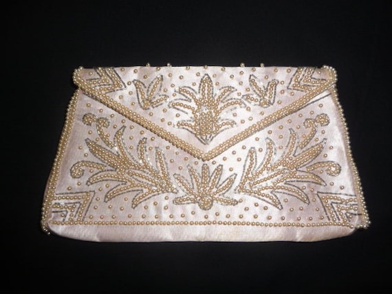 Items similar to Vintage Pink Beaded Clutch on Etsy