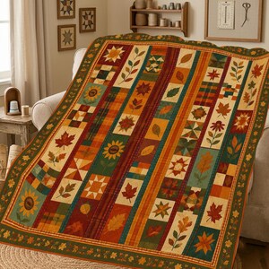 Coperta trapuntata in stile patchwork con foglie autunnali: accogliente coperta da letto autunnale con girasoli color ruggine e arancione.