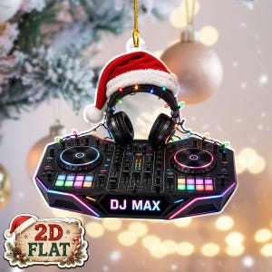 May include: A flat, decorative ornament featuring a black DJ controller with colourful buttons and the text DJ MAX. The controller is topped with black headphones wearing a red and white Santa hat, all wrapped in a string of glowing multicoloured Christmas lights.