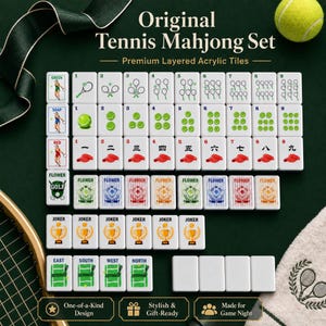 May include: A tennis-themed Mahjong set with premium layered acrylic tiles. The set features tiles with tennis ball and racket designs, alongside traditional Mahjong symbols and numbers. The set is displayed on a green surface with a tennis ball and racket visible.