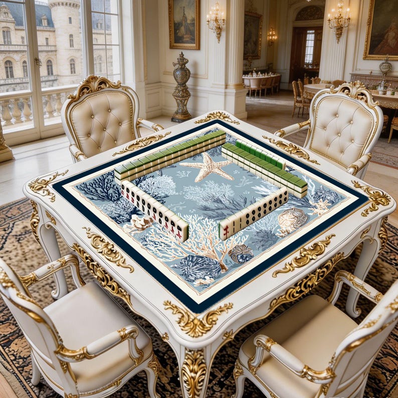 Square game mat shown in use with mahjong tiles, highlighting the spacious playing area and elegant marine-inspired design.