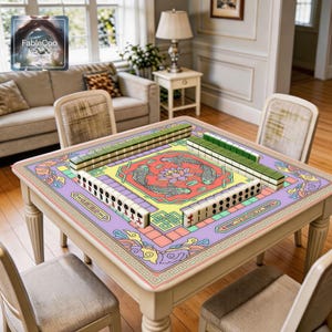 Pastel koi game mat shown in use with mahjong tiles, highlighting the spacious square playing area, smooth cushioned surface, and refined macaron-inspired artwork with koi fish, lotus blossom, cloud accents, geometric linework, and a delicate pastel border design.