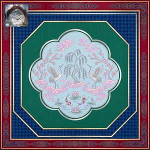 Flat lay product image of the original Asian decorative mahjong mat, showing the full composition with a central medallion featuring cranes, koi fish, flowering branches, lotus flowers, and cloud motifs surrounded by geometric framing and richly layered borders.