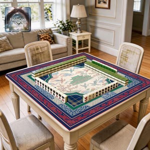 Oriental scenic game mat shown in use with mahjong tiles, highlighting the spacious square playing area, smooth cushioned surface, and elegant artwork featuring a central palace scene, crane motifs, blossom branches, lotus accents, and a refined blue, green, red, and ivory color palette.