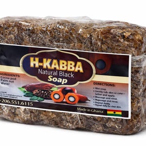 May include: A rectangular block of H-KABBA Natural Black Soap, wrapped in clear plastic. The label features the brand name, ingredients (cocoa pod, palm nut, water), and directions. The soap has a dark brown, textured appearance.