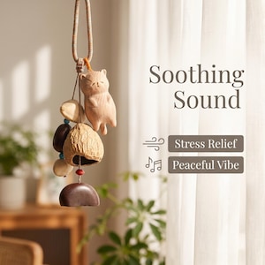 Campana de viento de madera hecha a mano con forma de gato y conchas de semillas naturales: un regalo bohemio único para amantes de los gatos, adorno ecológico para exteriores.