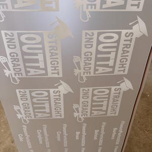 May include: A sheet of white adhesive stickers featuring the text STRAIGHT OUTTA 2ND GRADE with a graduation cap and diploma icon. Below each sticker, the hashtag #teamForte2026 is printed alongside various individual names in a list format.