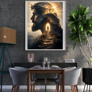 May include: A framed wall art print featuring a profile portrait of a bearded figure wearing a crown of thorns, superimposed over a landscape with a path leading toward a glowing cave entrance and three crosses on a distant hill under a golden sky.