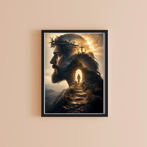 May include: A framed wall art print featuring a double exposure illustration. The profile of a bearded figure wearing a crown of thorns blends into a rocky landscape with a path leading toward a bright stone archway and three distant crosses.
