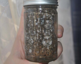 Jar of Polymer Clay Heads. Original Art Sculpture