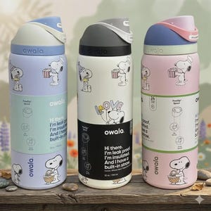 May include: Three Owala insulated water bottles with Snoopy graphics. The bottles are in pastel colors: lavender, white, and pink. Each bottle has a different Snoopy design and text that reads "Hi there. I'm leak proof. I'm insulated. And I have a built-in straw."