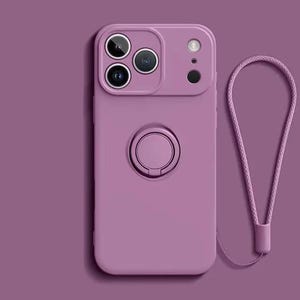 May include: A lilac phone case featuring a ring holder and a matching wrist strap. The case has a camera lens protector with three circular lenses and a single lens. The phone case is made of a smooth material.