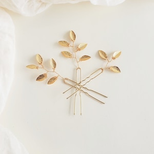 Gold Boho leaf hair vine and leaf hairpins for bridal or prom hair do. Bridesmaid hair pieces. Woodland or fairy hair. Hair do with long braid.