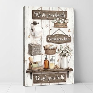 May include: A vertical wall art print on a white wood-plank background featuring bathroom items. It includes signs reading Wash your hands, Comb your hair, and Brush your teeth. Elements include a toilet paper roll, tissue box, basket, and cotton stems.