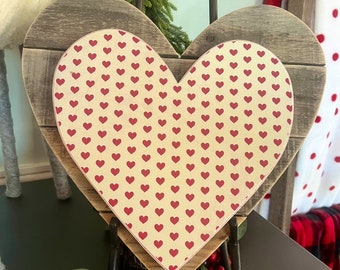 Wood heart with heart paper for Valentine’s Day