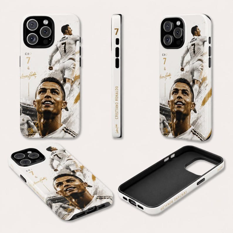 May include: White phone case featuring a collage of Cristiano Ronaldo. The design includes images of the soccer player in action, his signature, and the number 7. The case has a black interior and a white exterior.