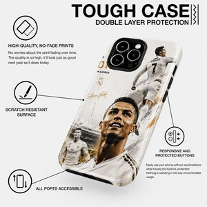 May include: A white and black phone case featuring a portrait of a soccer player. The case has the text "TOUGH CASE" and "DOUBLE LAYER PROTECTION". Additional text includes "HIGH-QUALITY, NO-FADE PRINTS", "SCRATCH RESISTANT SURFACE", and "ALL PORTS ACCESSIBLE".
