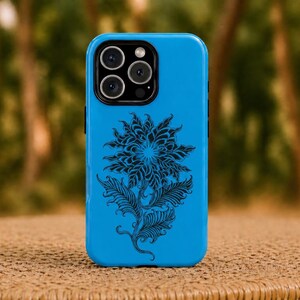 May include: A vibrant blue phone case with a black floral pattern. The case has a shiny surface and a camera aperture with several lenses. The floral design includes a large flower and leaves.