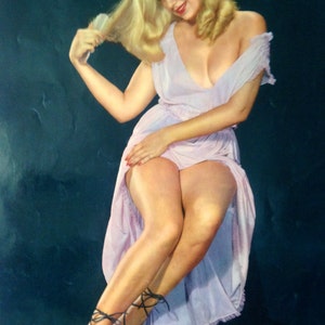May include: A woman with long blonde hair is wearing a light purple dress with a low neckline. She is sitting with her legs crossed and wearing black strapped heels.