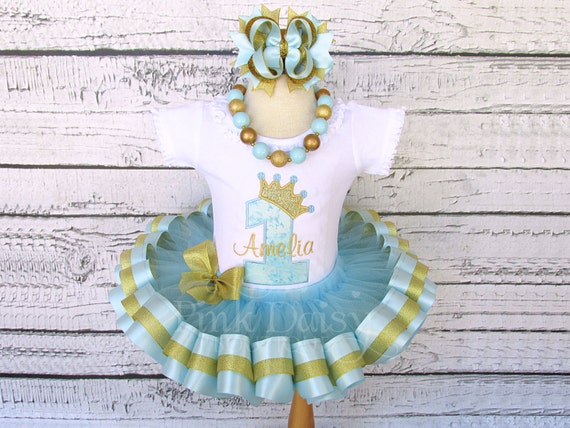 Girls Baby Blue and Gold Royal Princess Appliqué Shirt and Satin Ribbon Tutu Birthday Outfit with Matching Boutique Bow and Chunky Necklace. Il_570xn