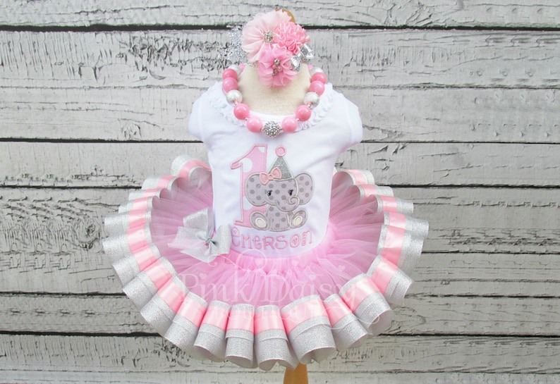 Girls Pink and Sparkle Silver Elephant Appliqu\u00e9 Shirt and Ribbon Trimmed Tutu Birthday Outfit with Matching Headband and Chunky Necklace.