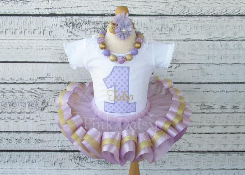 Girls Lavender and Gold Personalized Appliqu\u00e9 Shirt and Ribbon Trim Tutu Birthday Outfit with Matching Headband and Chunky Necklace.