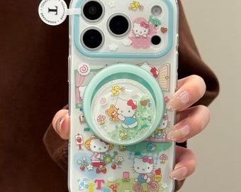 Simpatica custodia magnetica verde Hello Kitty Shaker con Pop Socket glitterato, compatibile con MagSafe, per iPhone 17 Pro Max, iPhone 16 15 14 13 Pro Max