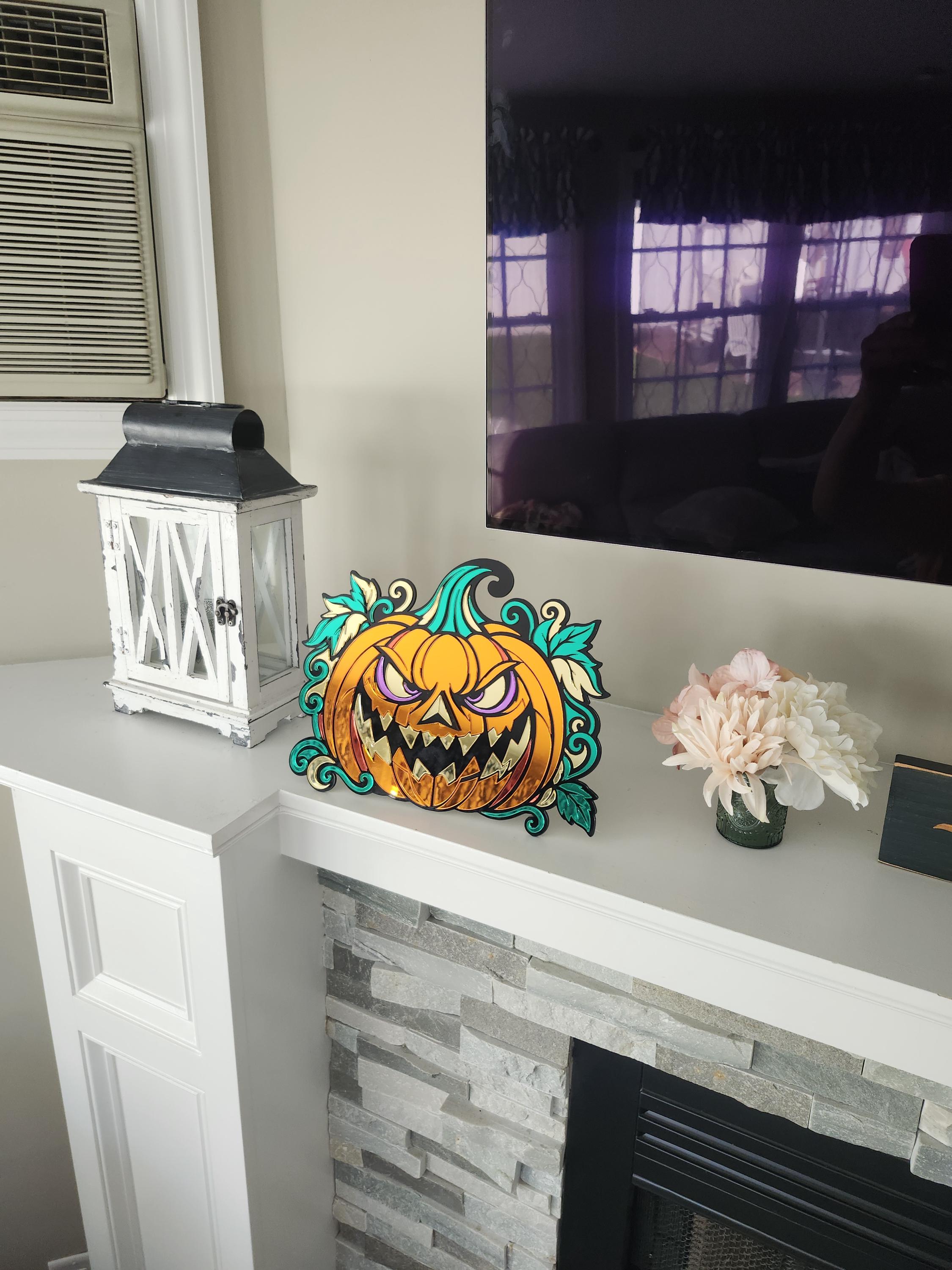 Mirrored acrylic Jack O Lantern — alternate angle of the laser engraved gothic piece
