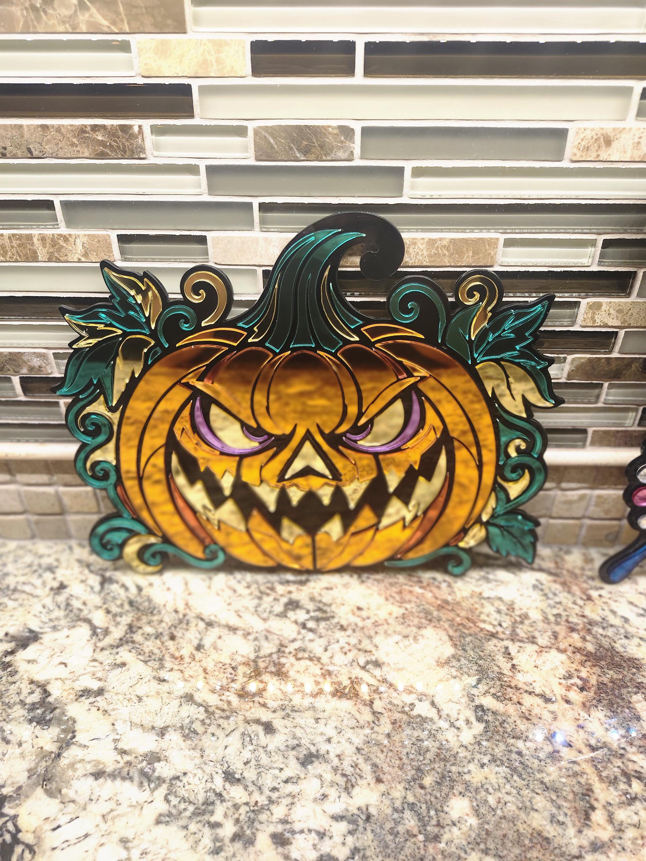 Mirrored acrylic Jack O Lantern — close-up of the laser engraved detail of the laser engraved gothic piece