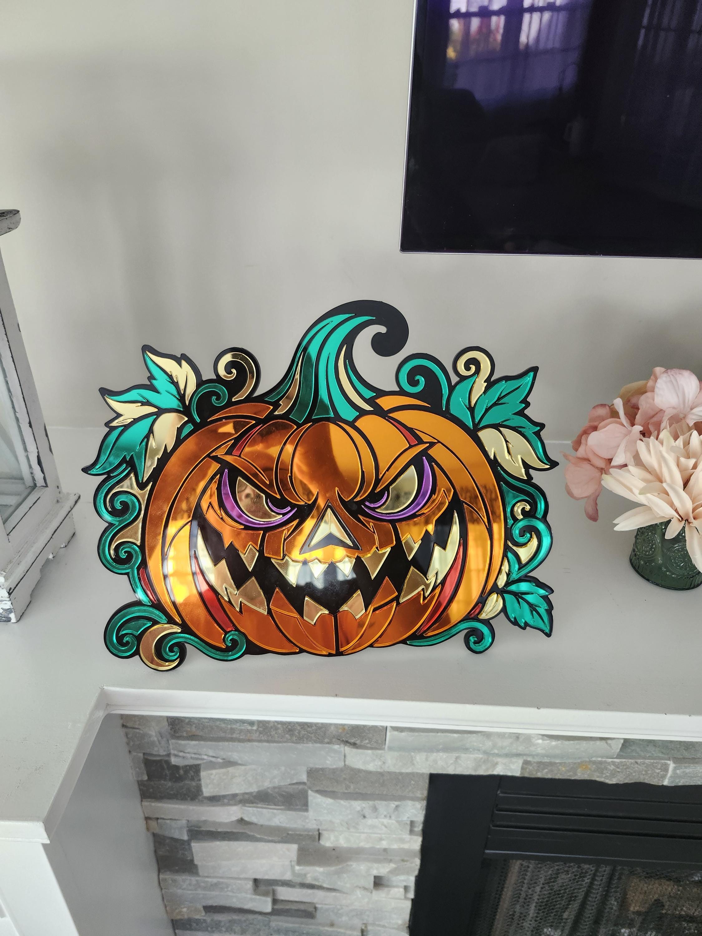 Mirrored acrylic Jack O Lantern — shown styled in a home setting of the laser engraved gothic piece