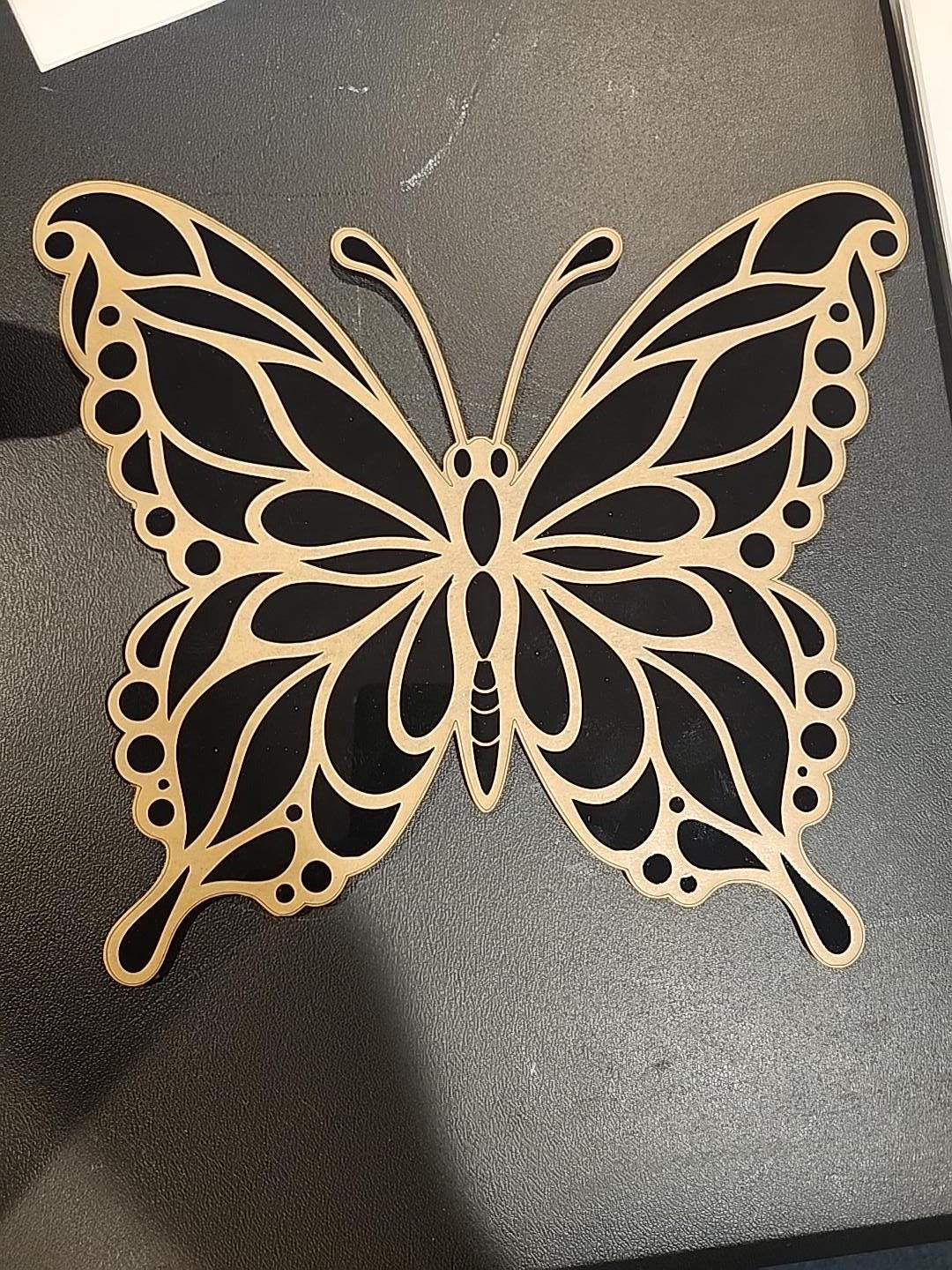 Mirrored Acrylic Butterfly Wall Art — wood grain and finish detail of the laser engraved studio piece